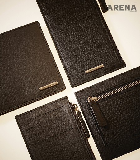 (왼쪽부터 시계 방향으로) 어두운 회색 반지갑 43만원대·지퍼가 달린 명함 지갑 32만원대·얇은 두께의 명함 지갑 34만원대·송아지 가죽 소재의 명함 지갑 32만원대 모두 에르메네질도 제냐 꾸뛰르 제품.