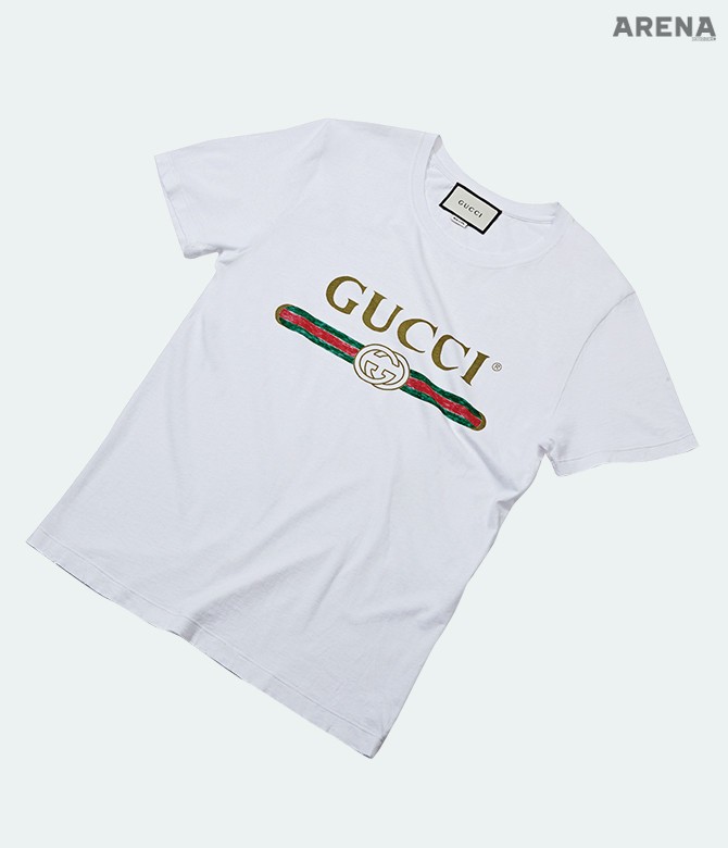 곳곳이 해져 빈티지한 분위기를 낸 티셔츠 가격미정 구찌 제품.